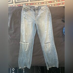 Distressed denim jean